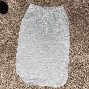 Cotton slightly below knee “sweat pant” skirt .